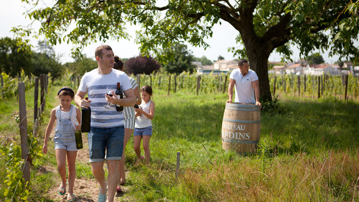 family visiting vineyards